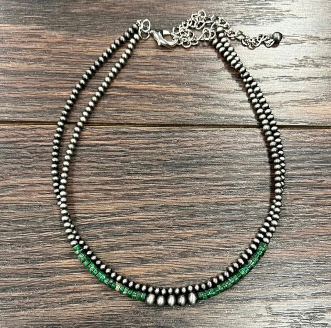 Green gemstone & pearls